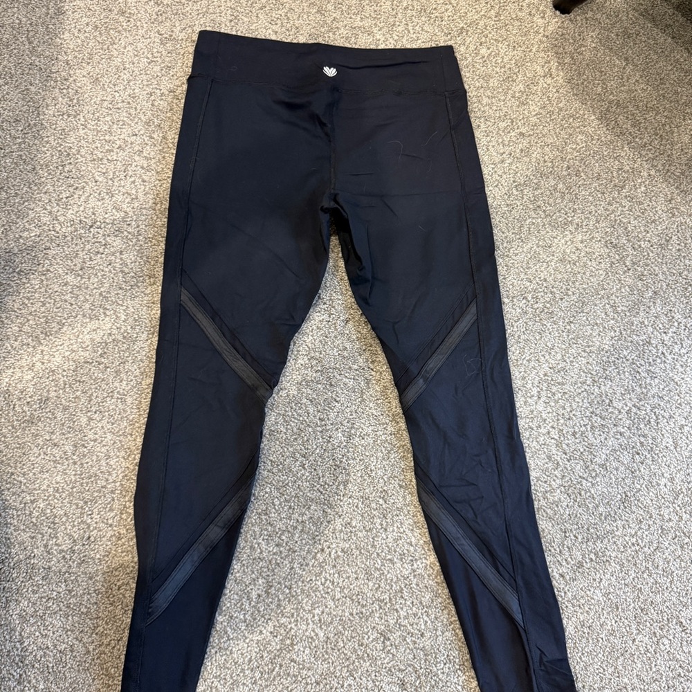 Forever 21 black leggings with mesh details